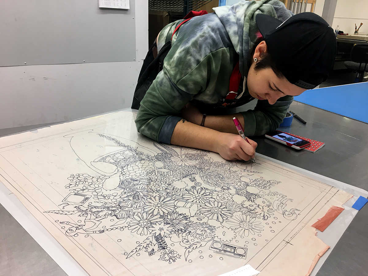 Maggie Middleton helping to transfer line drawing to lithography plate